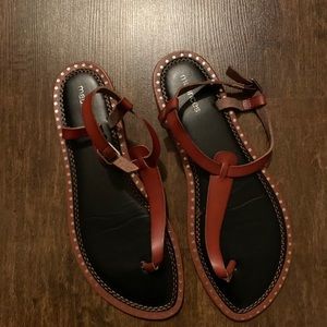 Black woman’s sandals